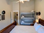Triple tier twin-size bunk bed in the guest bedroom